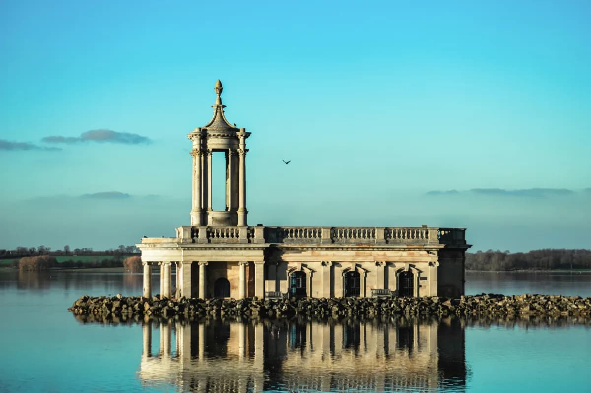 Rutland Water reservoir with Normanton Church partially submerged at the water edge