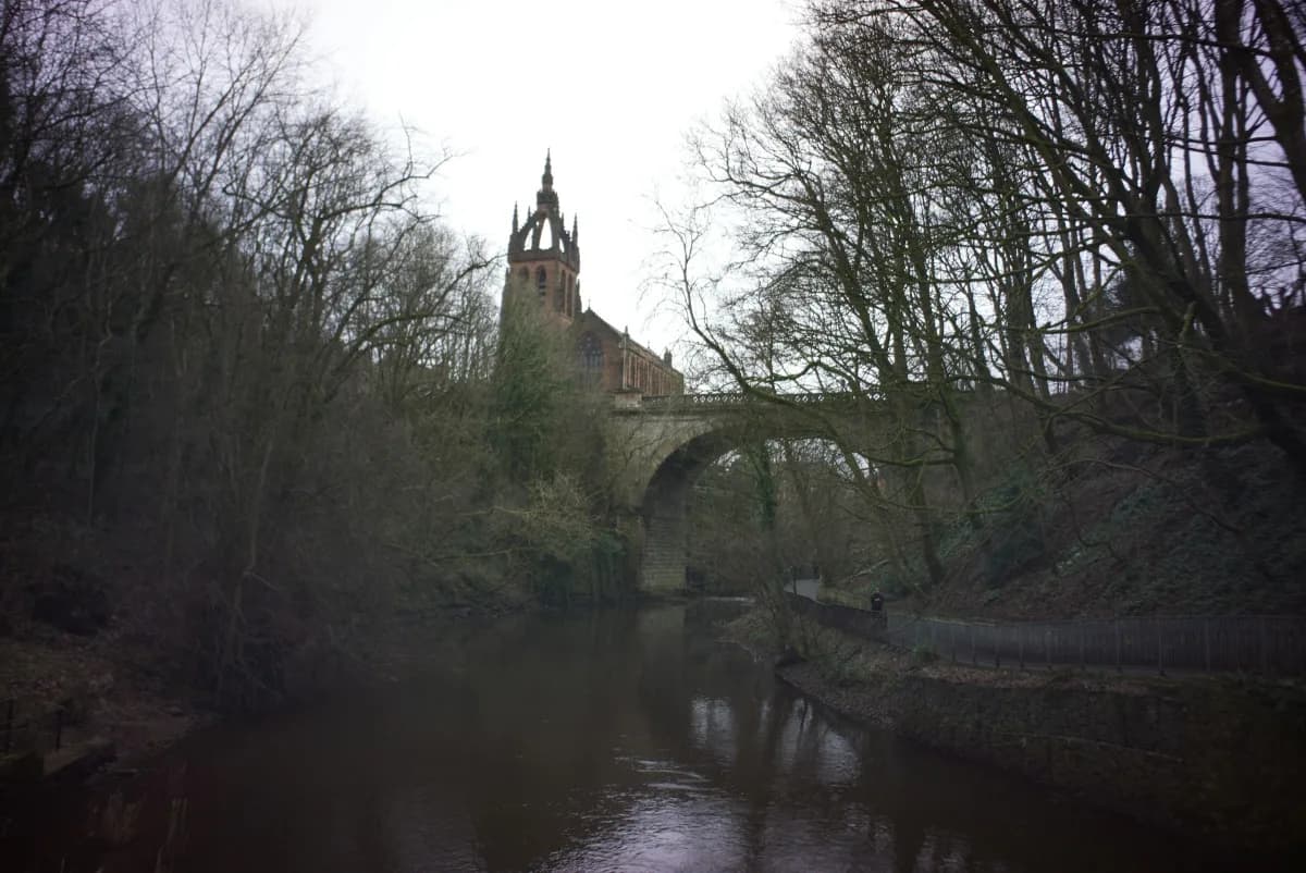 Kelvin Walkway in winter — North Kelvinside spire rising over the wooded river