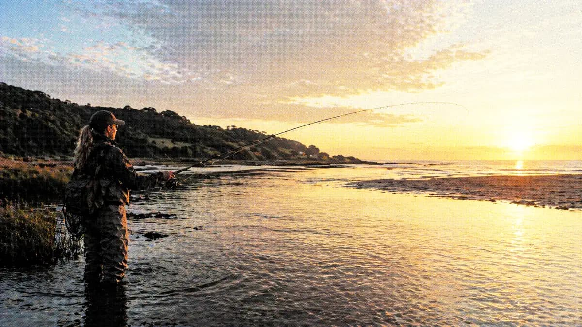 Angler with sea bass