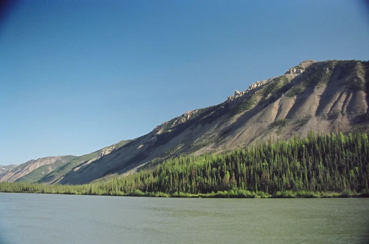 South Nahanni River — Looking across the South Nahanni River from the Virginia Falls dock
