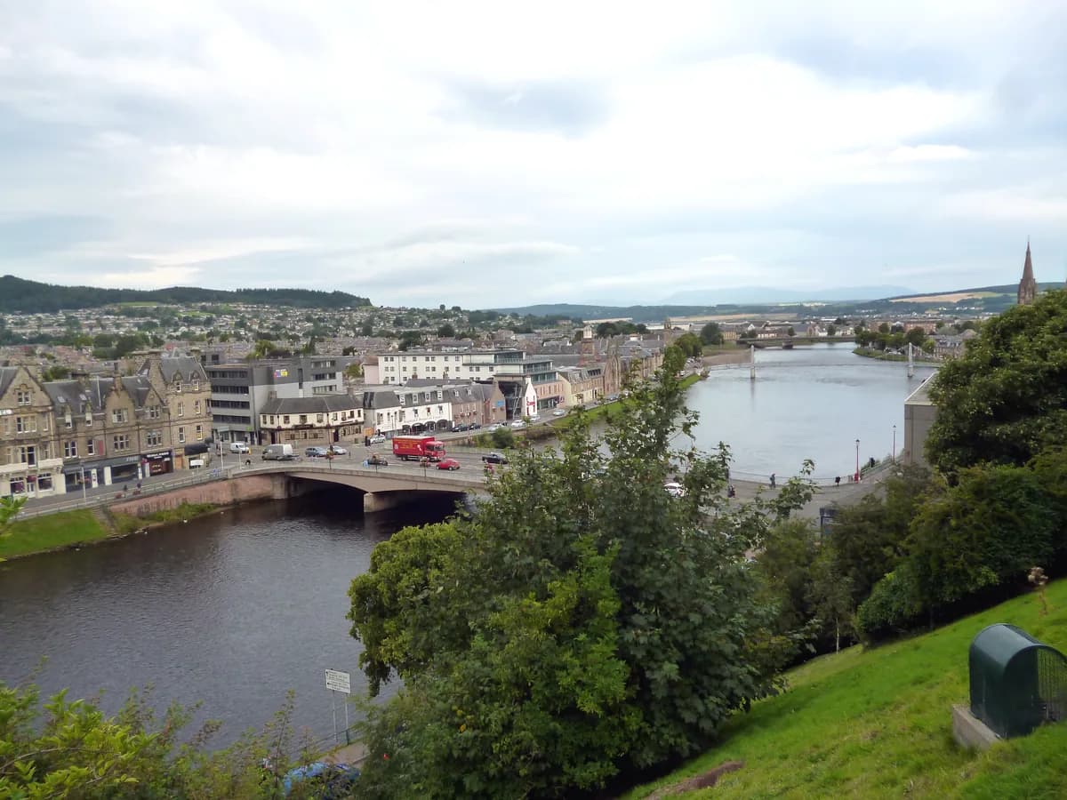 Wide view of the River Ness flowing through Inverness, Scotland, past Ness Bridge.