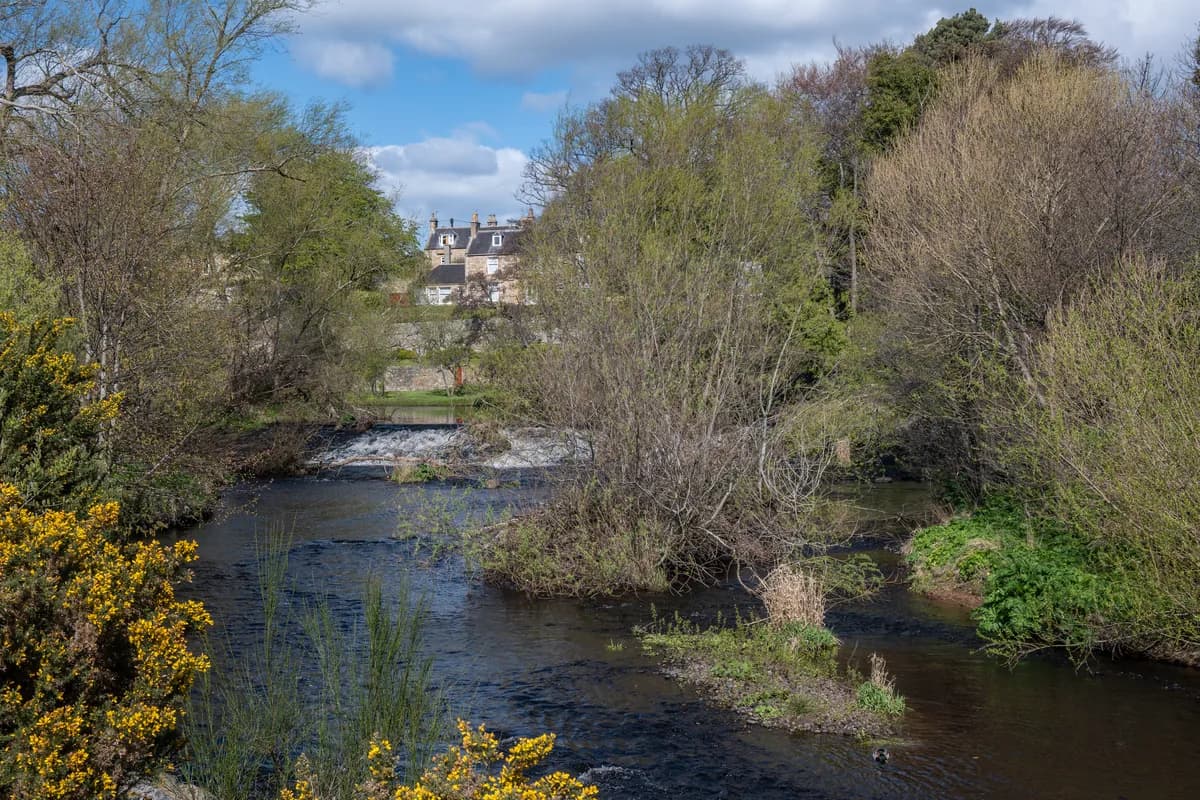 The River Lossie flowing through Elgin, Moray, seen from Bishopmill Bridge.