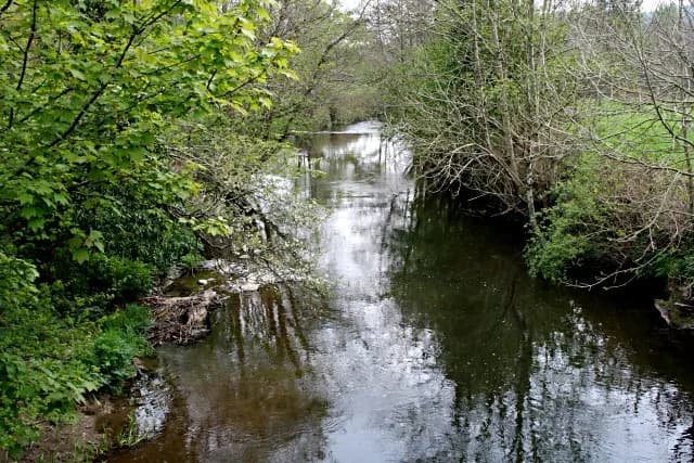 The River Inny, a large tributary of the River Tamar, flowing beneath Bealsmill Bridge in Cornwall.