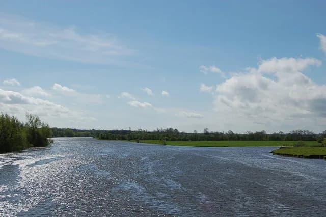 The Agivey River joining the wider River Bann, viewed from Agivey Bann Bridge.