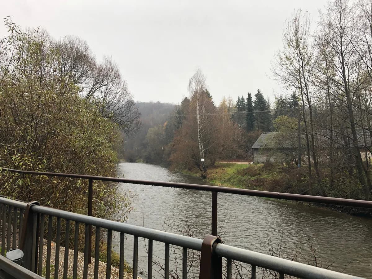 The upper Hron river flowing past Brezno in central Slovakia on an overcast day