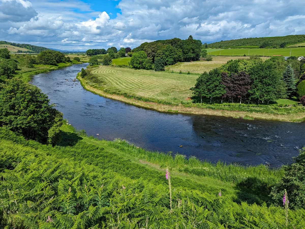 Aerial view of the River Don winding through farmland near Dyce, Aberdeenshire