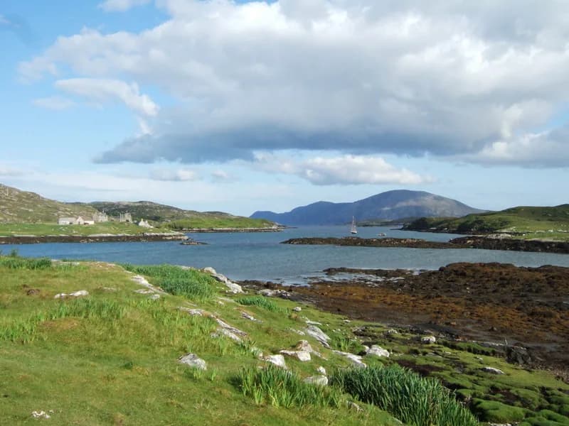 Calm evening light on Loch Leosavay, a hill loch in North Harris, Outer Hebrides, Scotland.