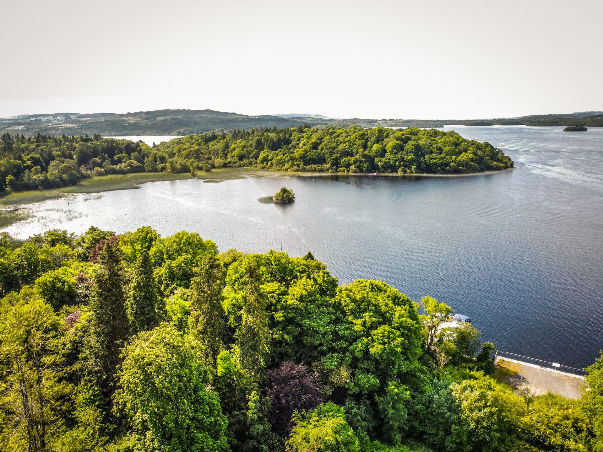 Aerial view of Lough Arrow, County Sligo, the full breadth of the limestone lough ringed by farmland.