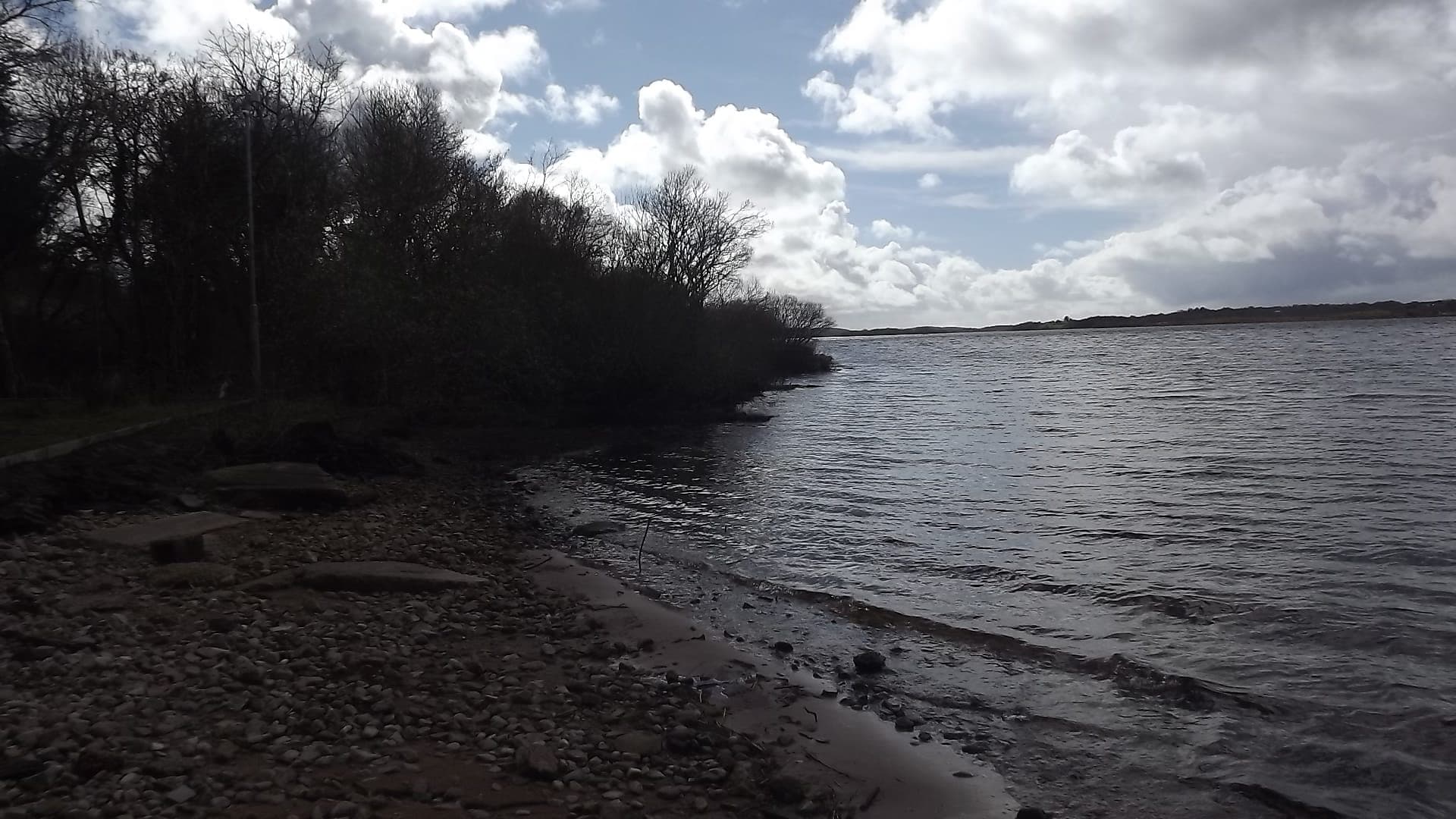 The shoreline of Lough Beltra, County Mayo, open lough water.